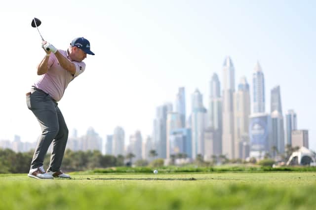 Richie Ramsay tees off on the eighth hole during round one of the Hero Dubai Desert Classic at Emirates Golf Club. Picture: Richard Heathcote/Getty Images.