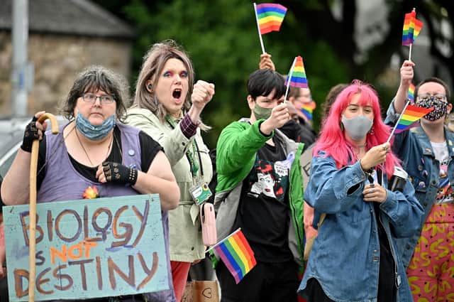 Trans rights activists hold a demonstration outside the Scottish Parliament (Picture: Jeff J Mitchell/Getty Images)