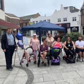 Community Councillors and members of the public along with Josh Mennie from Karen Adams office get set to tackle the town centre.