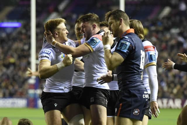 Glasgow Warriors duo Kyle Steyn, left, and Ollie Smith celebrate after scoring a try against Edinburgh at BT Murrayfield.