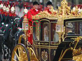 Queen Elizabeth II, accompanied by the Prince of Wales and Duchess of Cornwall, returns to Buckingham Palace, London, in the Diamond Jubilee State Coach, having delivered The Queen's Speech. The King and Queen Consort will travel to the coronation in the modern Diamond Jubilee State Coach and return in the historic Gold State Coach.