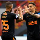 Kemar Roofe and James Tavernier celebrate the Rangers captain making it 2-0. Picture: SNS