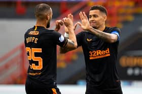 Kemar Roofe and James Tavernier celebrate the Rangers captain making it 2-0. Picture: SNS