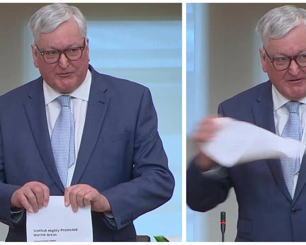 SNP MSP Fergus Ewing rips up up a consultation document on controversial highly protected marine areas (HPMAs) during a debate in the Scottish Parliament