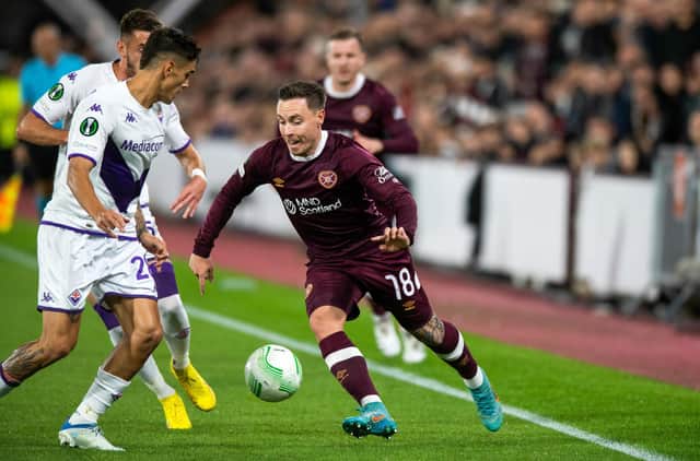 Barrie McKay tries to dart past the Fiorentina rearguard.