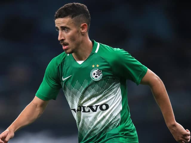 Dolev Haziza of Maccabi Haifa runs with the ball during the UEFA Europa League play-off match between Tottenham Hotspur and Maccabi Haifa on October 01, 2020 (Photo by Adam Davy - Pool/Getty Images)