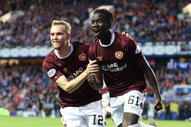 Hearts substitute Garang Kuol celebrates his injury-time equaliser in the 2-2 draw with Rangers.  (Photo by Ross MacDonald / SNS Group)