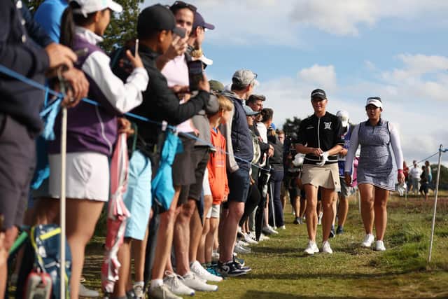 Charley Hull and Lilia Vu walk together during the final round of the AIG Women's Open at Walton Heath Golf Club. Picture: Steph Chambers/R&A/R&A via Getty Images.