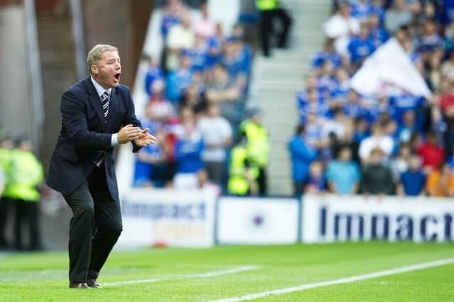 Ally McCoist encourages his Rangers team during the Champions League qualifier against Malmo at Ibrox in July 2011. (Photo by Bill Murray/SNS Group).