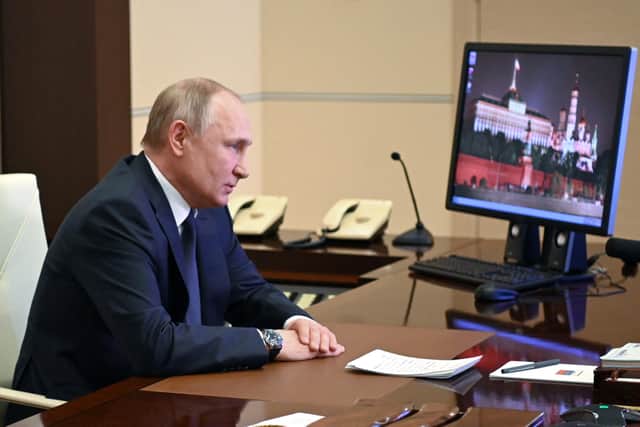 Russian President Vladimir Putin chairs a meeting with members of the Security Council via teleconference call at the Novo-Ogaryovo state residence outside Moscow, Russia, on March 3, 2022. (Photo by Andrey Gorshkov / SPUTNIK / AFP) (Photo by ANDREY GORSHKOV/SPUTNIK/AFP via Getty Images)