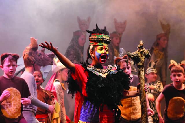 Roaring success: pupils at The Compass School in Haddington put on a splendid performance of The Lion King over the summer