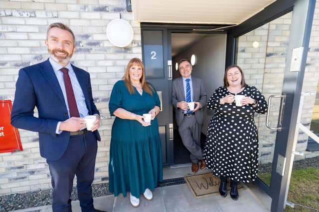 Wheatley Group Chief Executive Steven Henderson, left, is joined by Christine Laverty, Chief Officer of the Edinburgh Health and Social Care Partnership; Councillor Tim Pogson, Chair of the Edinburgh Integration Joint Board; and Laura Pluck, Group Director of Communities at Wheatley Group, at West Craigs