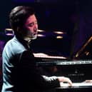 Pianist Ji Liu plays Rachmaninov's Piano Concerto No.2 with the Liverpool Philharmonic Orchestra during Classic FM Live at the Royal Albert Hall, London, in 2015. Photo: Ian West/PA Wire