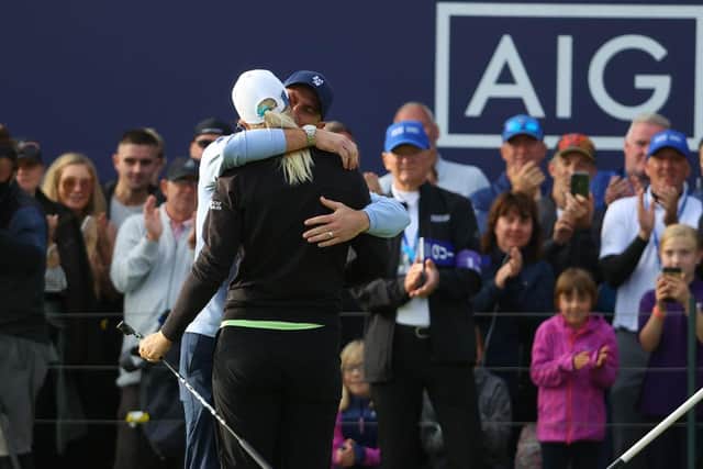 CARNOUSTIE, SCOTLAND - AUGUST 22:  Anna Nordqvist of Sweden poses with husband, Kevin McAlpine, on the 18th green after winning the AIG Women's Open at Carnoustie Golf Links on August 22, 2021 in Carnoustie, Scotland. (Photo by Andrew Redington/Getty Images)