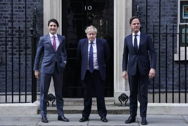 (Left to right) Canadian Prime Minister Justin Trudeau, Prime Minister Boris Johnson and Dutch Prime Minister Mark Rutte outside 10 Downing Street, London. Picture: PA