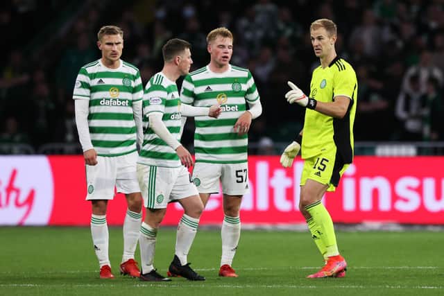 Celtic keeper Joe Hart passes on instructions to Callum McGregor and Carl Starfelt (far left) during last week's Europa League play-off win over AZ Alkmaar and the Swedish centre-back says the English international's constant promptings are proving real learning tools for the club's defenders. (Photo by Craig Williamson / SNS Group)