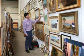 Some of the 200 paintings that covered the walls of the farmhouse.