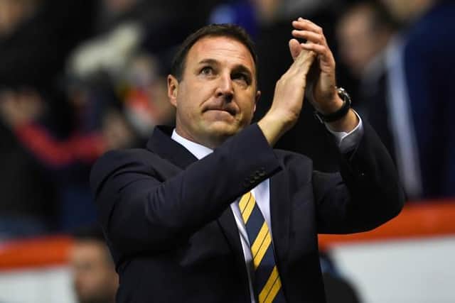 Malky Mackay acknowledges the crowd during his match in interim charge of Scotland for a friendly against Netherlands at Pittodrie in November 2017. (Photo by Craig Williamson/SNS Group).
