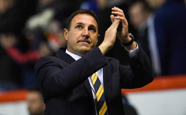 Malky Mackay acknowledges the crowd during his match in interim charge of Scotland for a friendly against Netherlands at Pittodrie in November 2017. (Photo by Craig Williamson/SNS Group).