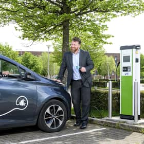 Andrew Mouat (standing), head of smart mobility at Glasgow-based ScottishPower, with Dr Stephen Breslin, CEO at Glasgow Science Centre. Picture: Ian Georgeson
