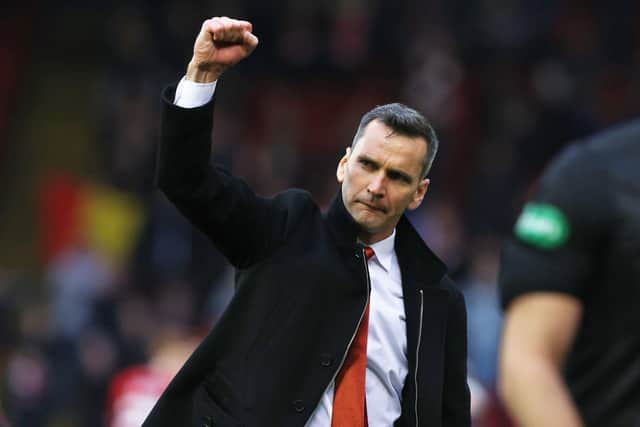 Aberdeen manager Stephen Glass celebrates at full-time.
