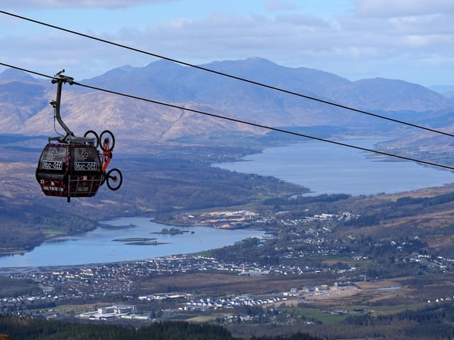 A gondola carries cyclists and their bikes to the start-line.