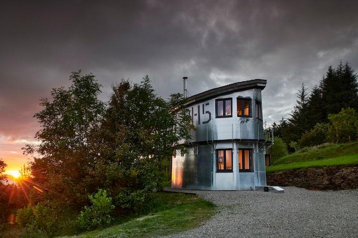 The team at Host Unusual say of this property: "A unique aluminium cabin for two, architect designed and perfectly set in the remote Scottish Highlands, for spectacular views over the Sound of Mull."