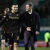 Motherwelll manager Graham Alexander, pictured with  Tony Watt, maintains relations between the pair will not be impacted by the striker signing a pre-contract agreement with Dundee United.  (Photo by Alan Harvey / SNS Group)