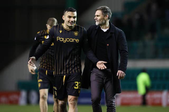 Motherwelll manager Graham Alexander, pictured with Tony Watt, maintains relations between the pair will not be impacted by the striker signing a pre-contract agreement with Dundee United. (Photo by Alan Harvey / SNS Group)