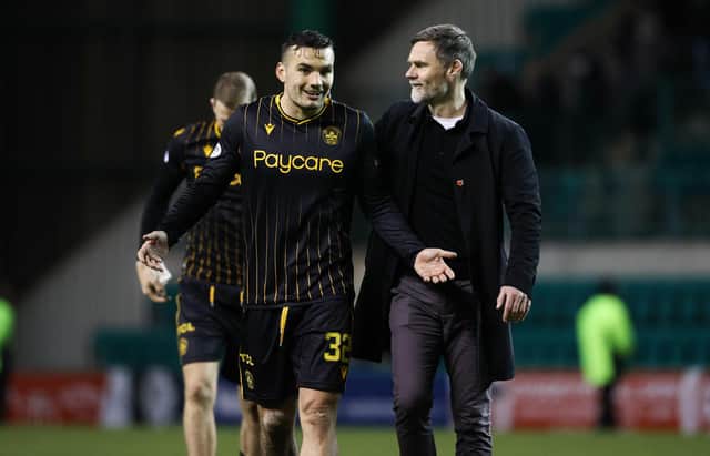 Motherwelll manager Graham Alexander, pictured with  Tony Watt, maintains relations between the pair will not be impacted by the striker signing a pre-contract agreement with Dundee United.  (Photo by Alan Harvey / SNS Group)