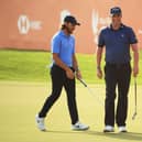 Marc Warren smiles after holing a birdie putt on the 18th green in the final round of the Abu Dhabi HSBC Championship. Picture: Andrew Redington/Getty Images.