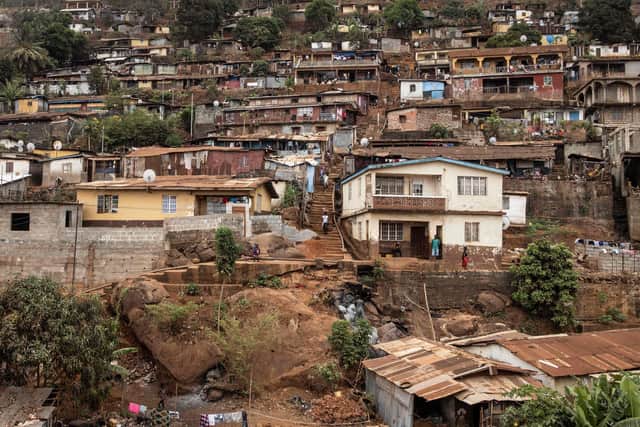 A densely populated neighbourhood is pictured on the side of a mountain in Freetown on April 13, 2022.  Picture: JOHN WESSELS/AFP via Getty Images