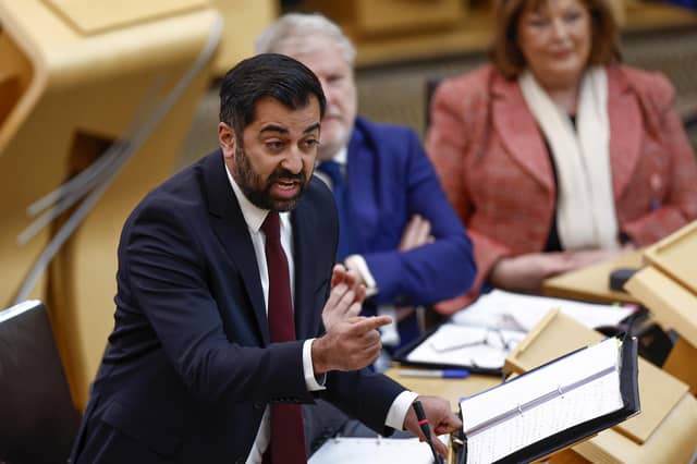 Scottish First Minister Humza Yousaf reacts as he answers questions during First Minister's Questions. Picture: Jeff J Mitchell/Getty Images