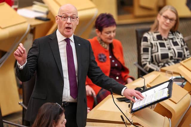 Scottish First Minister John Swinney during FMQs at the Scottish Parliament building yesterday (Picture: Jeff J Mitchell/Getty Images)
