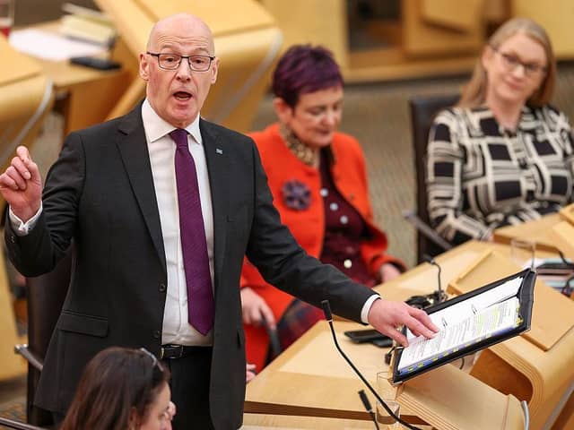 Scottish First Minister John Swinney during FMQs at the Scottish Parliament building yesterday (Picture: Jeff J Mitchell/Getty Images)