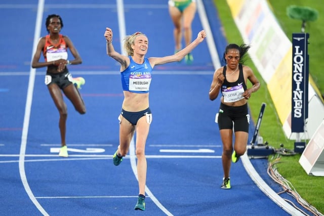 Eilish McColgan of Team Scotland celebrates winning the gold medal as she crosses the finish line in the women's 10,000m final on day six of the Birmingham 2022 Commonwealth Games.