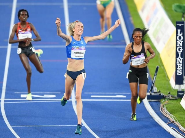 Eilish McColgan of Team Scotland celebrates winning the gold medal as she crosses the finish line in the women's 10,000m final on day six of the Birmingham 2022 Commonwealth Games.