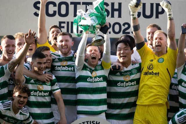 Celtic's Callum McGregor lifts the Scottish Cup after the 3-1 win over Inverness. (Photo by Alan Harvey / SNS Group)