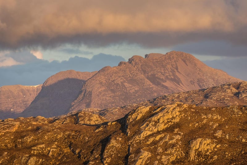 Generally regarded as the most remote Munro, A'Mhaighdean rises above the wilderness of Fisherfield in northwest Scotland, to the south of Ullapool. It takes most people several days to get there and back, so camping equipment is a must, with popular routes including a start around Loch a'Bhraoin (pictured).