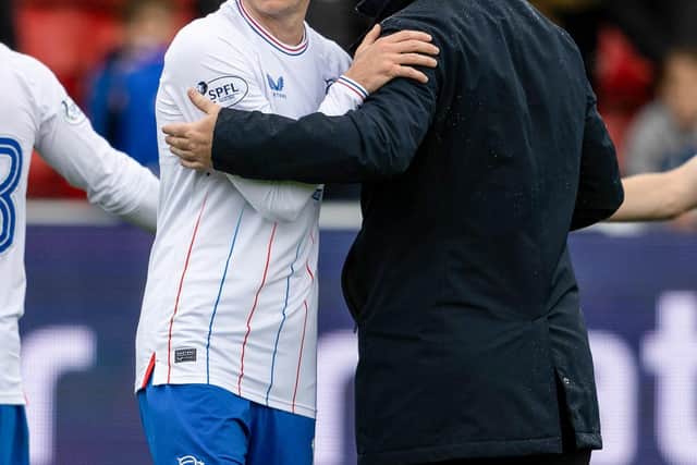 Rangers' Tom Lawrence is acknowledged by manager Michael Beale after his first competitive outing in a year, which came with his 73rd minute introduction as substitute as the Ibrox men secured a 2-0 win over Ross County at Dingwall.(Photo by Mark Scates / SNS Group)