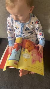 Two-year-old Alfie Smeaton loves his new book.