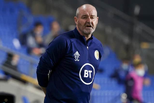 Scotland's coach Steve Clarke speaks to his players during the UEFA Nations League B Group 2 match against Israel at the Netanya Municipal Stadium on November 18, 2020.(Photo by JACK GUEZ/AFP via Getty Images)