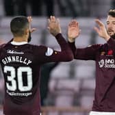 Craig Halkett, right, is back in action with Hearts after injury.