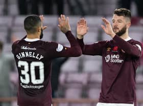 Craig Halkett, right, is back in action with Hearts after injury.