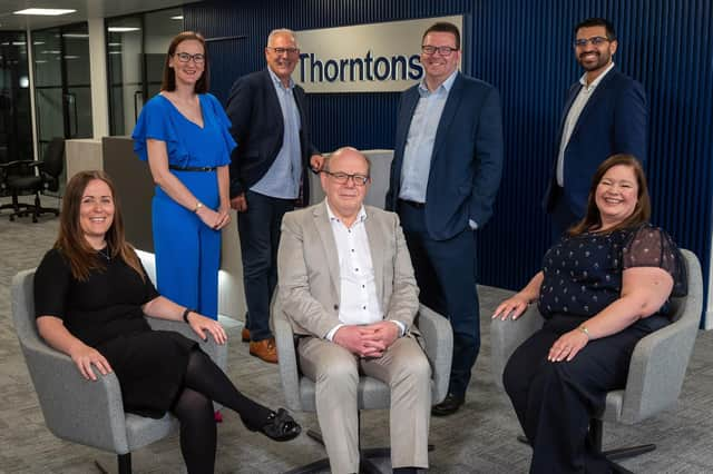 Back row from left: Jayne Macfarlane, Colin Graham, Richard Hart, Gurjit Pall. Front from left: Aimee Gibbons, Paul Haniford, Pamela Muir. Picture: Sandy Young Photography