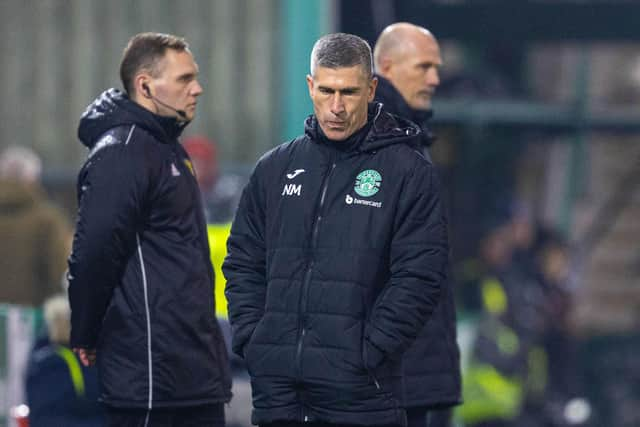 Hibs manager Nick Montgomery looks dejected during the 2-0 defeat by Rangers.