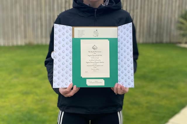 West Kilbride's Louise Duncan shows off her Augusta National Women's Amateur invitation.