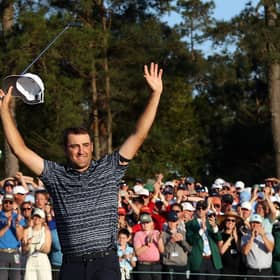 AUGUSTA, GEORGIA - APRIL 10: Scottie Scheffler celebrates on the 18th green after winning the Masters at Augusta National Golf Club on April 10, 2022 in Augusta, Georgia. (Photo by Jamie Squire/Getty Images)