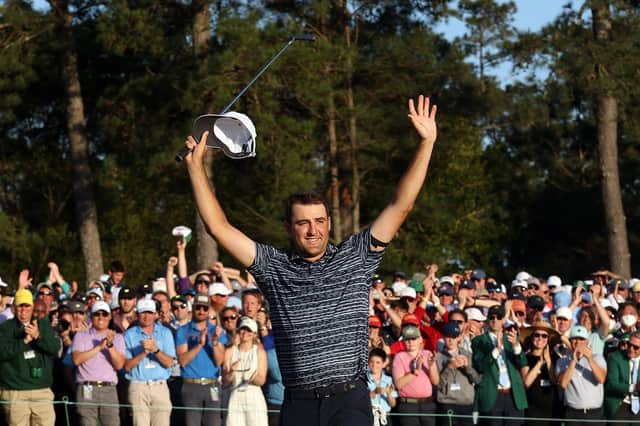 AUGUSTA, GEORGIA - APRIL 10: Scottie Scheffler celebrates on the 18th green after winning the Masters at Augusta National Golf Club on April 10, 2022 in Augusta, Georgia. (Photo by Jamie Squire/Getty Images)