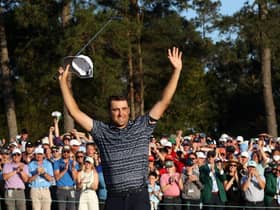 AUGUSTA, GEORGIA - APRIL 10: Scottie Scheffler celebrates on the 18th green after winning the Masters at Augusta National Golf Club on April 10, 2022 in Augusta, Georgia. (Photo by Jamie Squire/Getty Images)